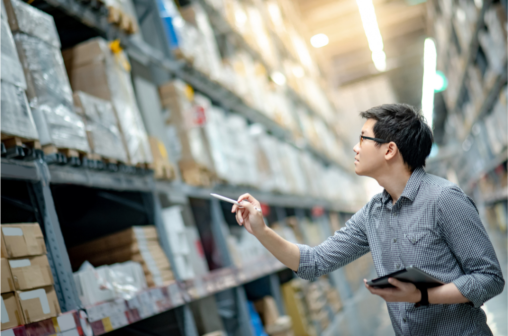 Man counting inventory