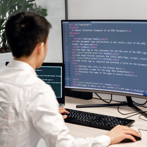 Man working on his computer coding
