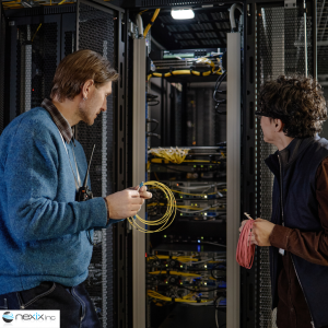 Two men building a physical server 