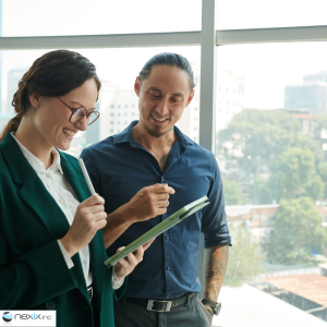 Man and woman looking at an ipad